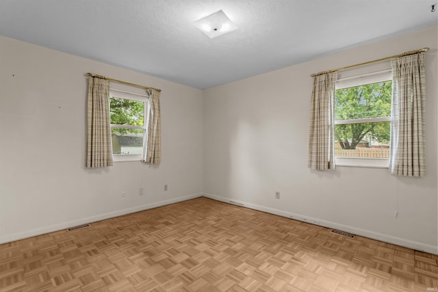 1105 E Southway Blvd, Kokomo, IN 46902 - empty room with baseboards and a textured ceiling