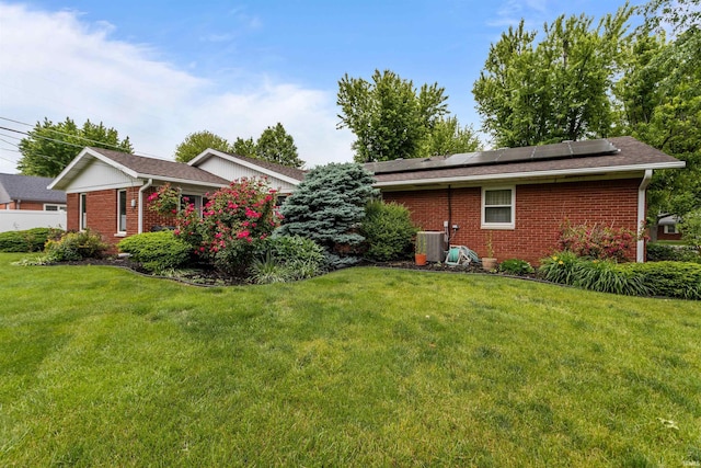1105 E Southway Blvd, Kokomo, IN 46902 - view of green lawn with central AC