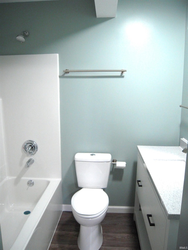 25123 Snyder St, Elkhart, IN 46514 - bathroom with vanity, baseboards, toilet, and wood finished floors