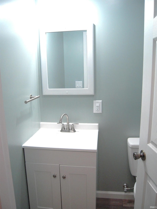 25123 Snyder St, Elkhart, IN 46514 - bathroom with vanity, toilet, and baseboards
