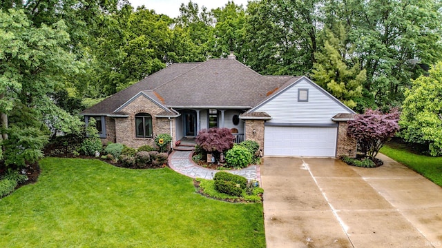 70 Mayflower Ct, Lafayette, IN 47909 - view of front facade featuring brick siding, a garage, concrete driveway, and a front yard