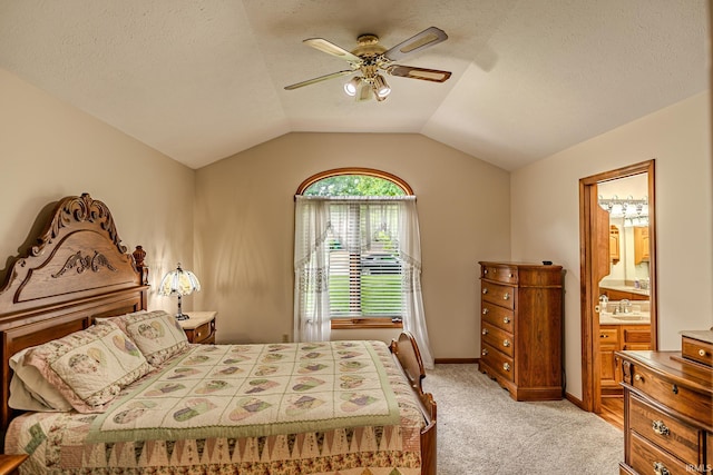 70 Mayflower Ct, Lafayette, IN 47909 - bedroom featuring light carpet, a sink, connected bathroom, lofted ceiling, and a ceiling fan