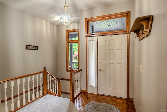 70 Mayflower Ct, Lafayette, IN 47909 - entrance foyer with baseboards and a chandelier