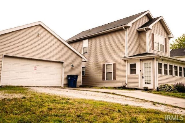 2447 S Meridian St, Marion, IN 46953 - view of front of property featuring driveway and a garage