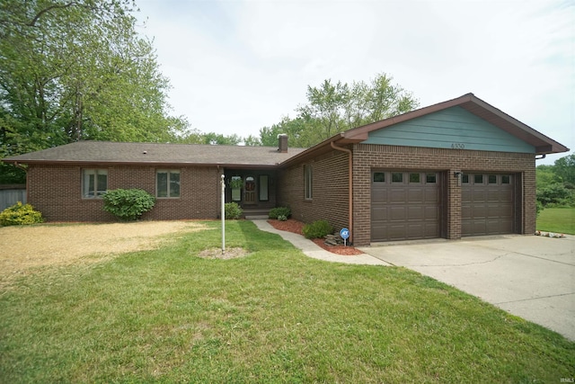4630 E Armstrong Rd, Leesburg, IN 46538 - ranch-style home with brick siding, driveway, an attached garage, and a front lawn