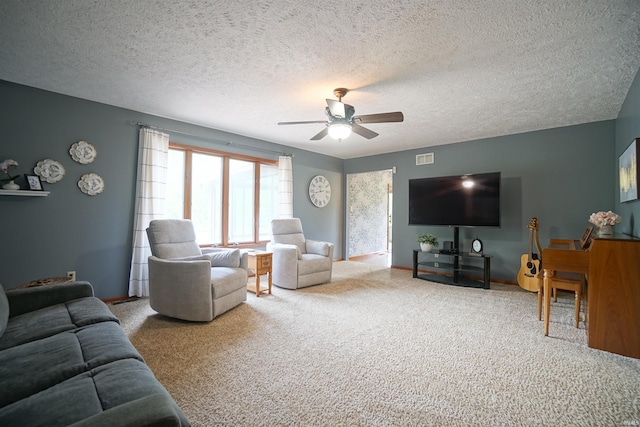 4630 E Armstrong Rd, Leesburg, IN 46538 - carpeted living room with ceiling fan, a textured ceiling, and baseboards