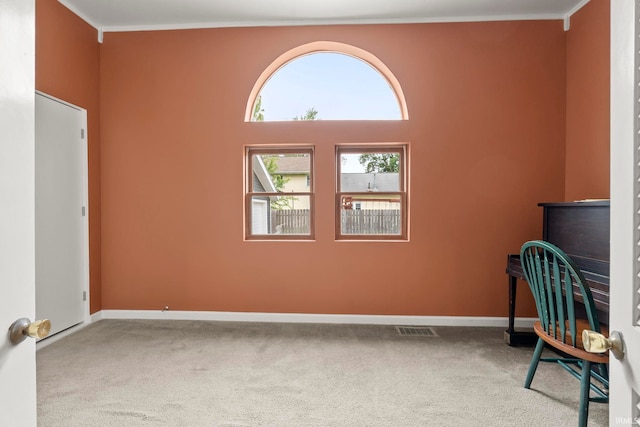 726 S Johnson, Bluffton, IN 46714 - carpeted spare room with baseboards and crown molding