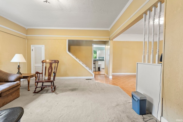 726 S Johnson, Bluffton, IN 46714 - living area with crown molding, baseboards, carpet floors, and a textured ceiling