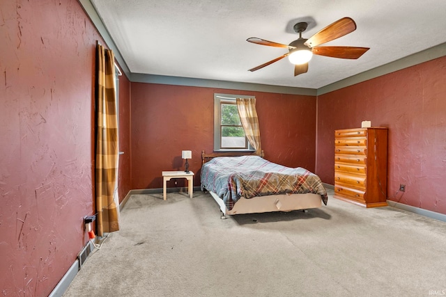 726 S Johnson, Bluffton, IN 46714 - carpeted bedroom with baseboards, a ceiling fan, and a textured wall