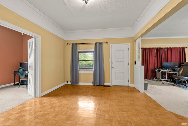 726 S Johnson, Bluffton, IN 46714 - entrance foyer with baseboards, ornamental molding, and a textured ceiling