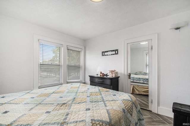 1224 N Main St, Elkhart, IN 46514 - bedroom with baseboards and a textured ceiling