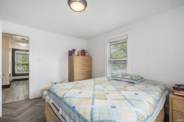 1224 N Main St, Elkhart, IN 46514 - bedroom featuring multiple windows and attic access