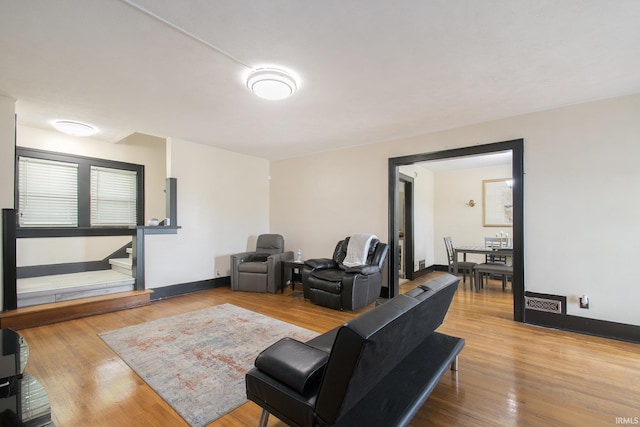 1224 N Main St, Elkhart, IN 46514 - living area featuring wood finished floors and baseboards