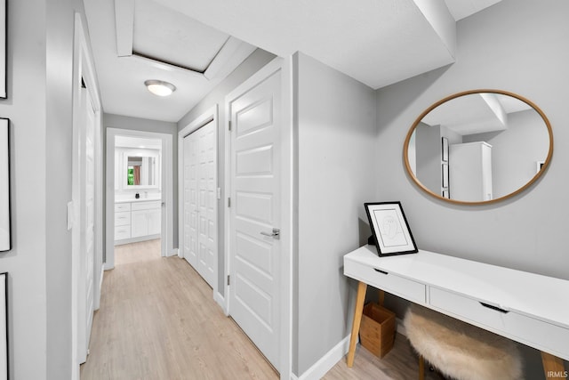 1718 Churchill Dr, South Bend, IN 46617 - hall featuring light wood-style flooring and baseboards