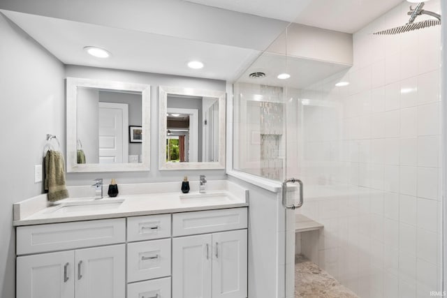 1718 Churchill Dr, South Bend, IN 46617 - full bathroom featuring a stall shower, double vanity, and recessed lighting