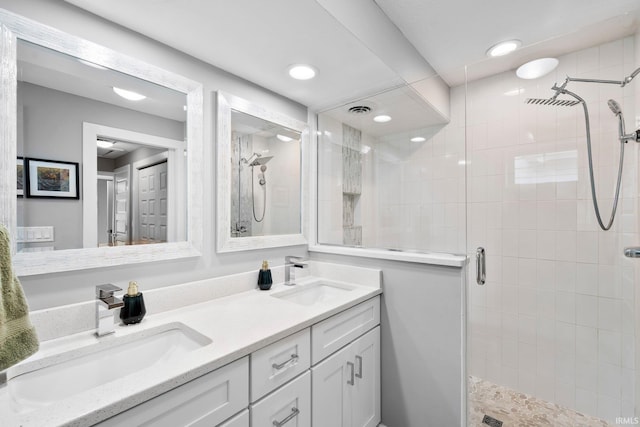 1718 Churchill Dr, South Bend, IN 46617 - full bath with a stall shower, double vanity, and recessed lighting