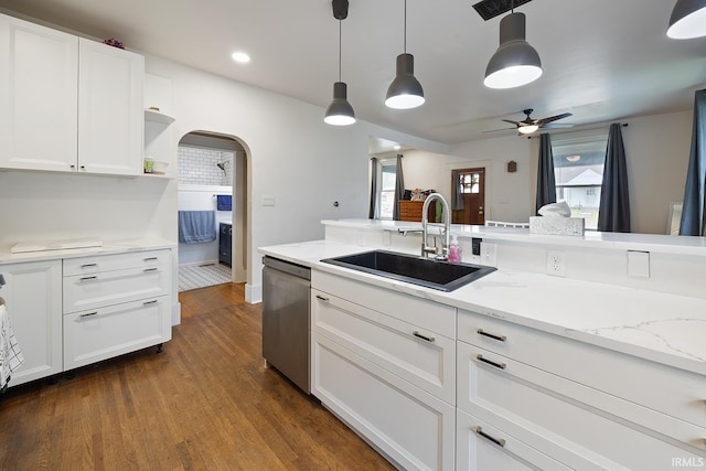1413 Franklin St, Lafayette, IN 47905 - kitchen featuring dishwasher, a sink, arched walkways, white cabinetry, and ceiling fan