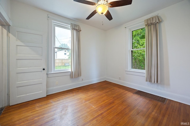 1413 Franklin St, Lafayette, IN 47905 - empty room with wood-type flooring, baseboards, and a ceiling fan
