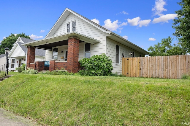 1413 Franklin St, Lafayette, IN 47905 - view of side of home featuring covered porch
