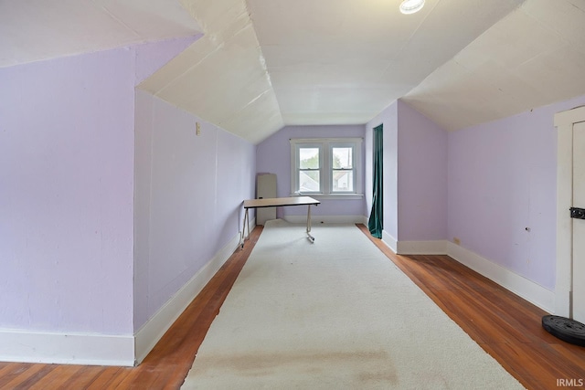 1413 Franklin St, Lafayette, IN 47905 - additional living space with wood finished floors, baseboards, and lofted ceiling