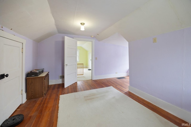 1413 Franklin St, Lafayette, IN 47905 - additional living space featuring wood-type flooring, lofted ceiling, and baseboards