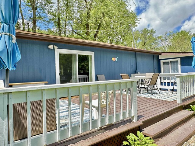 0731 S June Dr, Cromwell, IN 46732 - deck with outdoor dining area