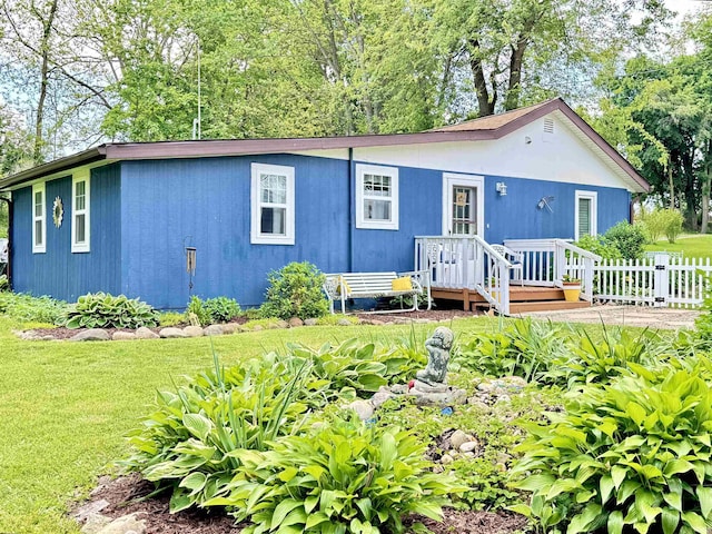 0731 S June Dr, Cromwell, IN 46732 - view of front facade with a wooden deck