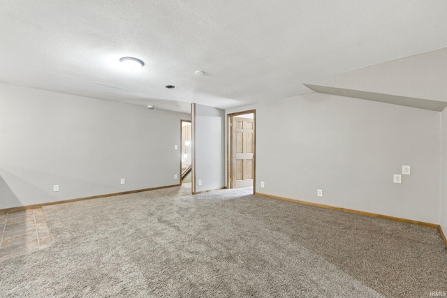 714 Hazel St, Auburn, IN 46706 - empty room with carpet, baseboards, and a textured ceiling