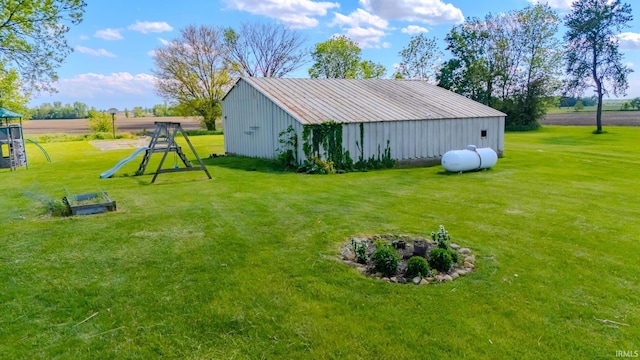 1415 E 500 N, Urbana, IN 46990 - view of grassy yard with an outbuilding