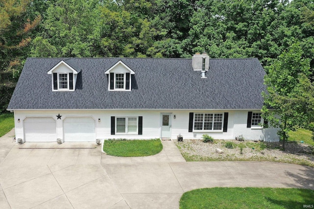 59483 Clover Rd, Mishawaka, IN 46544 - cape cod home with driveway, roof with shingles, and a chimney