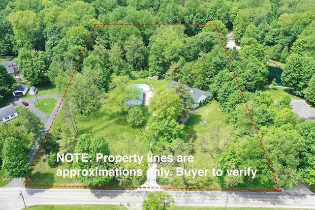 59483 Clover Rd, Mishawaka, IN 46544 - aerial view of property and surrounding area with a heavily wooded area and property boundaries highlighted