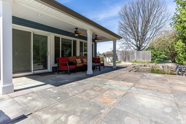 4000 E Stonegate Dr, Bloomington, IN 47401 - view of patio with an outdoor living space and a ceiling fan