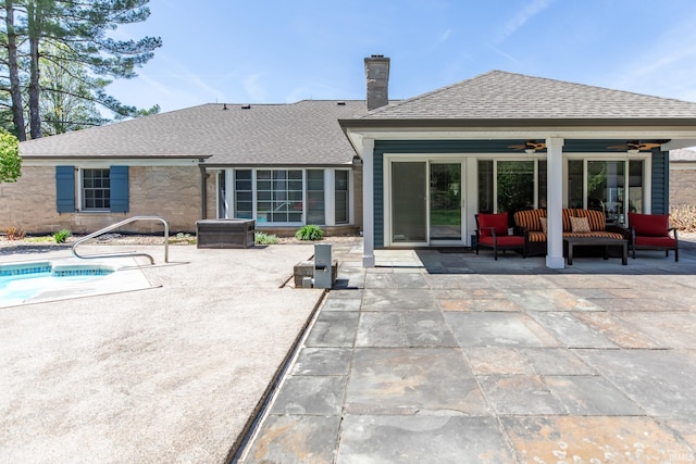 4000 E Stonegate Dr, Bloomington, IN 47401 - back of property featuring an outdoor hangout area, a ceiling fan, a patio, and a shingled roof