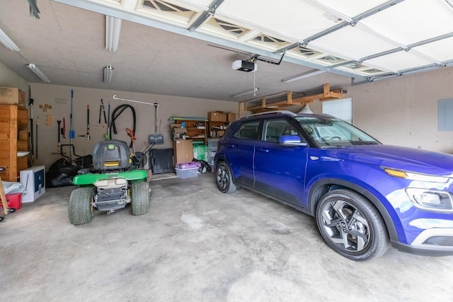 4000 E Stonegate Dr, Bloomington, IN 47401 - garage featuring a garage door opener