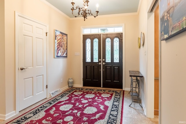 4000 E Stonegate Dr, Bloomington, IN 47401 - foyer entrance featuring a chandelier, crown molding, baseboards, and light tile patterned floors