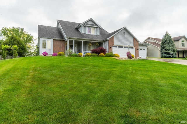 15304 Wild Meadows Pl, Leo, IN 46765 - view of front of property featuring covered porch, brick siding, a garage, concrete driveway, and a front lawn