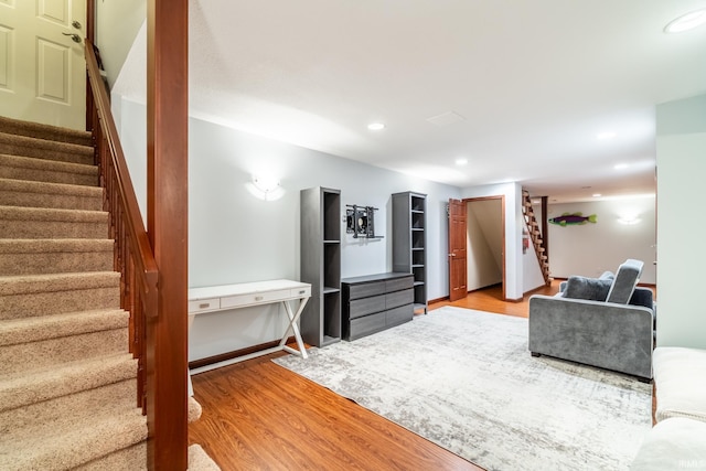 15304 Wild Meadows Pl, Leo, IN 46765 - living room with stairs, light wood-style floors, and recessed lighting