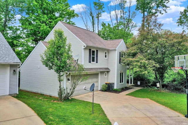 2210 S Laurelwood Cir, Bloomington, IN 47401 - view of front of house with concrete driveway, roof with shingles, and a front lawn