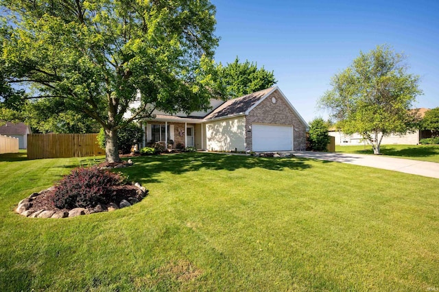 7805 W Kennedy Pkwy, Yorktown, IN 47396 - single story home with driveway, an attached garage, and brick siding