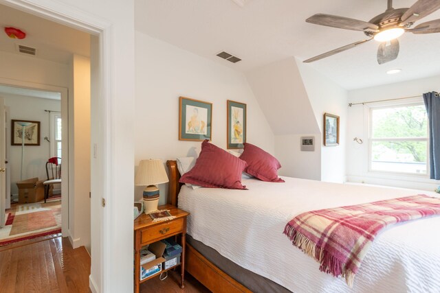1203 W 6th St, Bloomington, IN 47404 - bedroom with hardwood / wood-style floors, ceiling fan, and recessed lighting