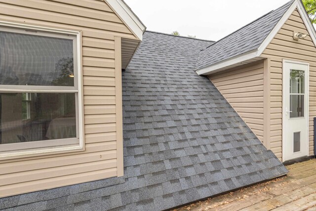 1203 W 6th St, Bloomington, IN 47404 - view of home's exterior featuring a shingled roof