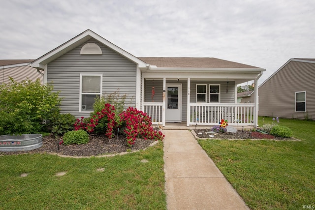 116 Wise Dr, Lafayette, IN 47909 - view of front of house featuring covered porch and a front lawn