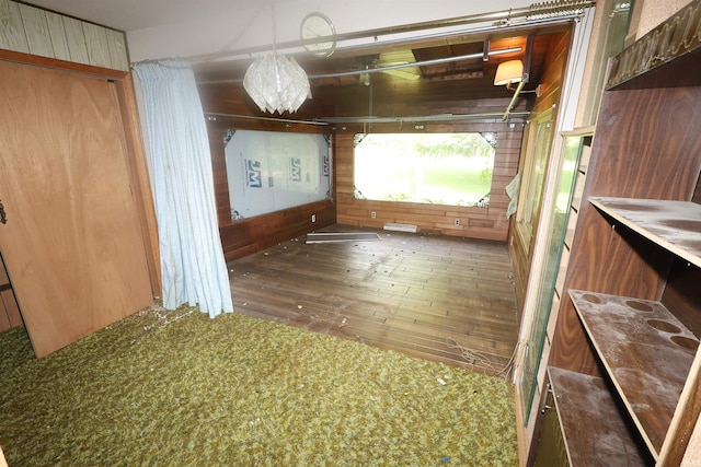56825 Elmer Ave, South Bend, IN 46619 - unfurnished room with hardwood / wood-style flooring and wooden walls