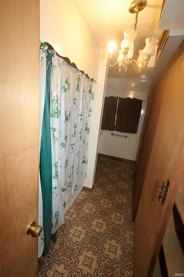 56825 Elmer Ave, South Bend, IN 46619 - bathroom featuring a chandelier