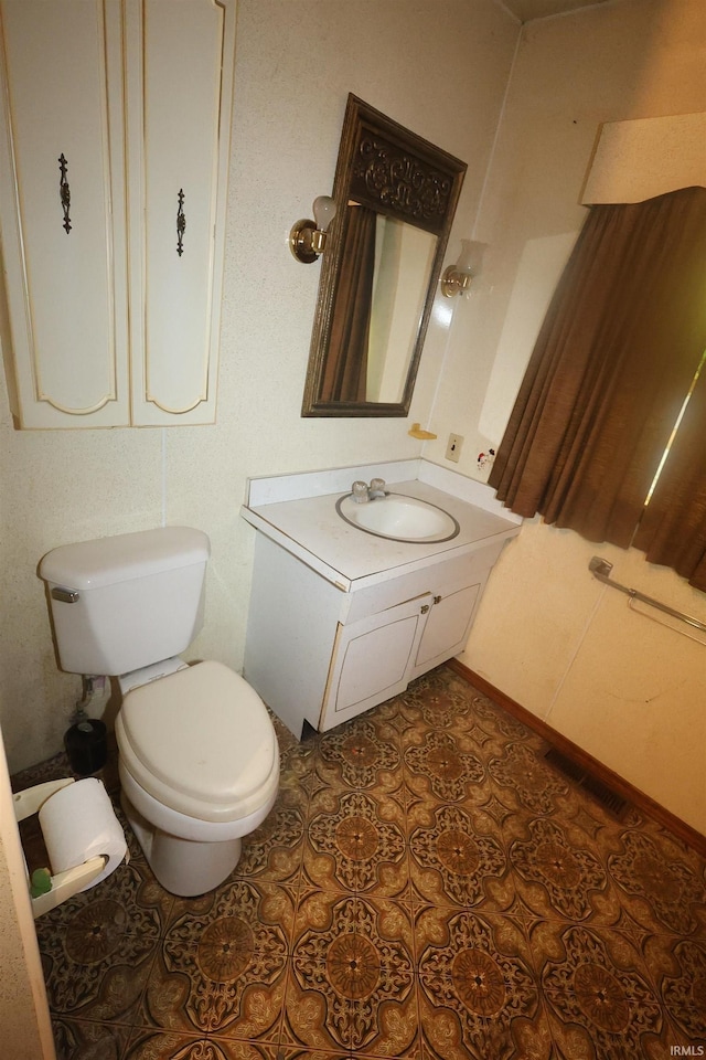56825 Elmer Ave, South Bend, IN 46619 - bathroom with toilet and vanity