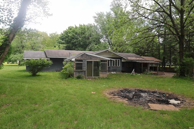 56825 Elmer Ave, South Bend, IN 46619 - back of house featuring a yard