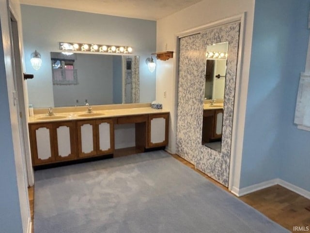 1880 N Michael Dr, Marion, IN 46952 - full bathroom with double vanity and baseboards