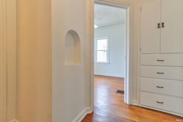2305 E Virginia St, Evansville, IN 47711 - hall with light wood-style flooring and baseboards