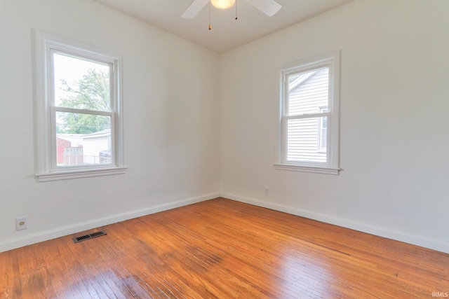 2305 E Virginia St, Evansville, IN 47711 - unfurnished room with ceiling fan, light wood finished floors, and baseboards