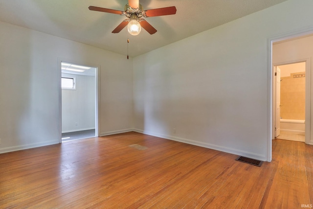 2305 E Virginia St, Evansville, IN 47711 - spare room featuring ceiling fan, light wood-type flooring, and baseboards